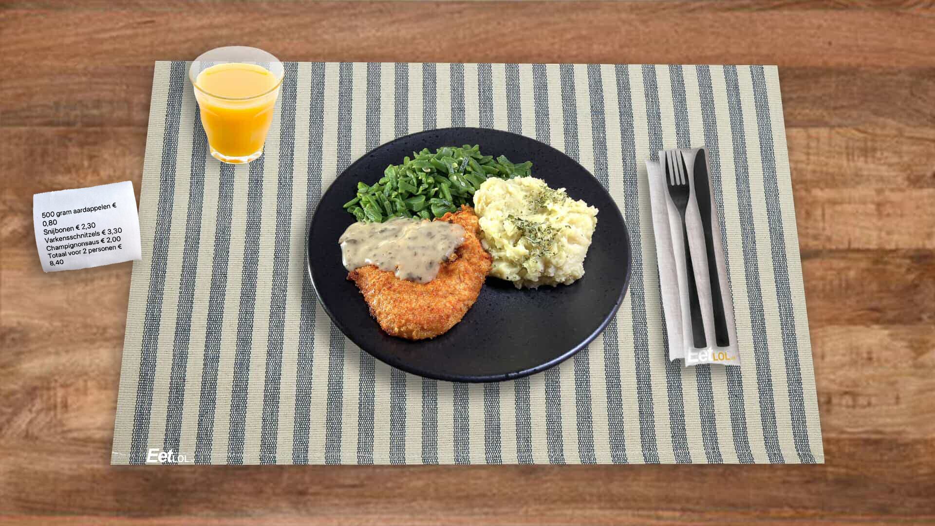 Aardappelpuree met snijbonen en varkensschnitzel