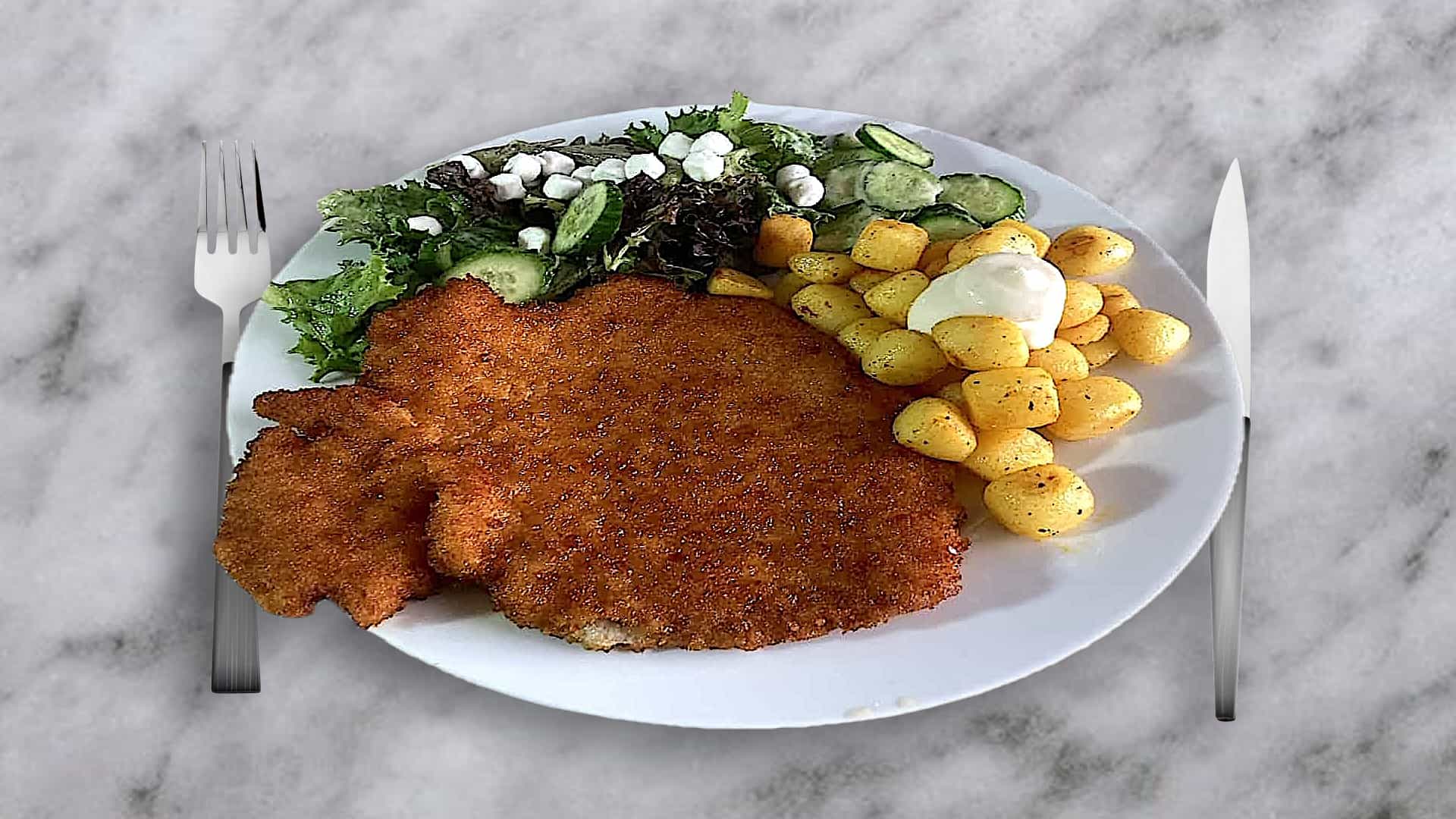 Schnitzel XXL met minikrieltjes en sla