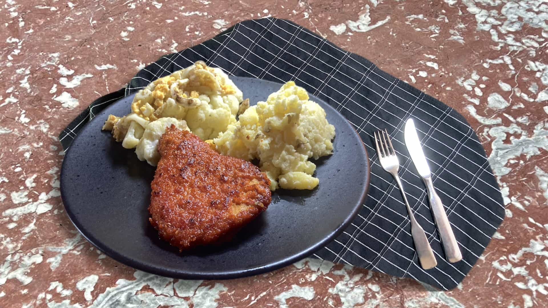 Bloemkool met ei en schnitzel